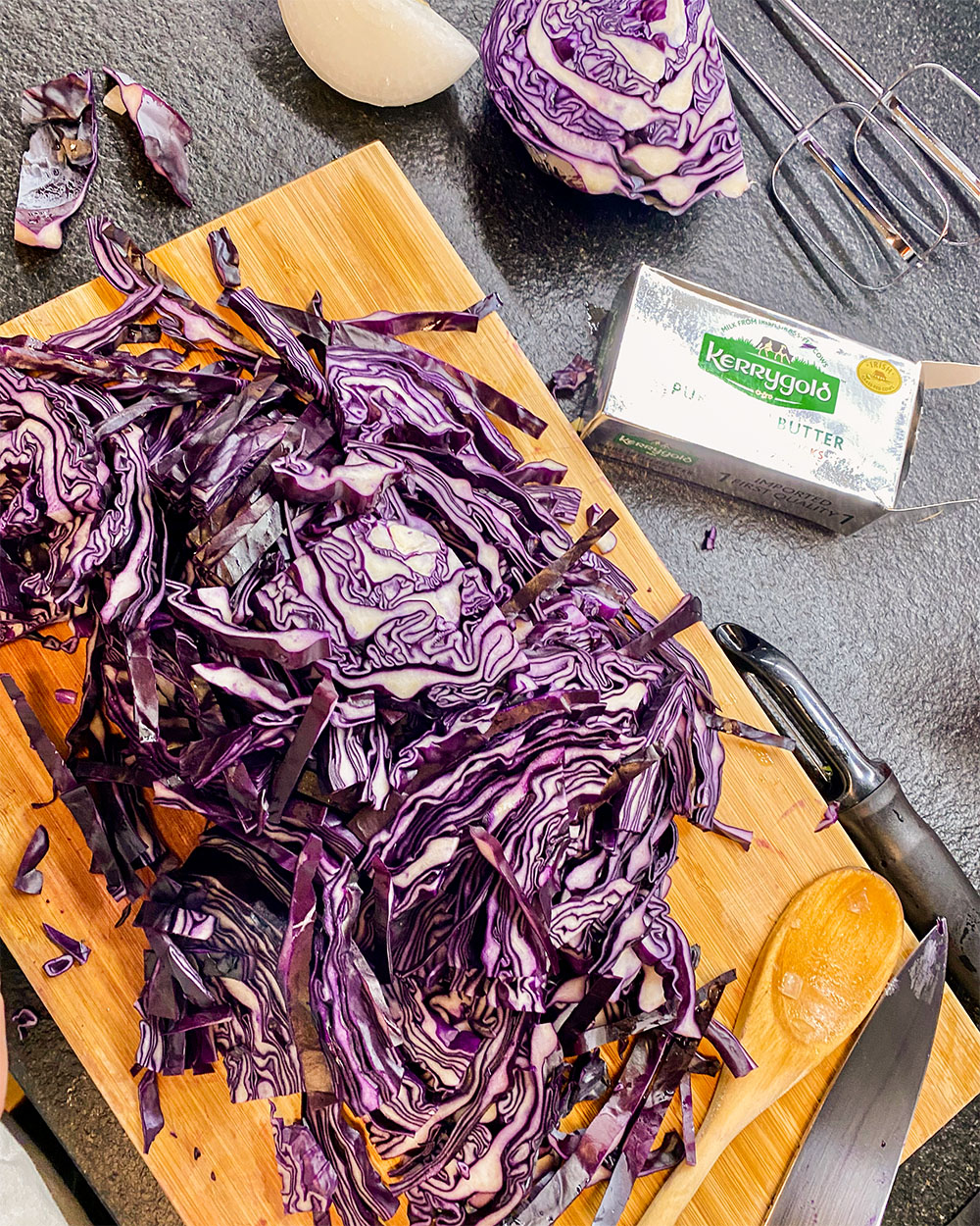 purple cabbage on a cutting board